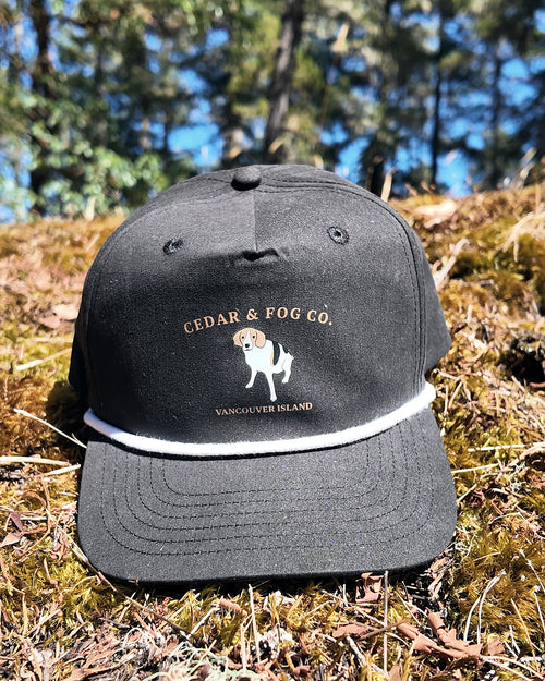 The Georgia Cap in black with the Cedar & Fog Co. coonhound embroidery and white rope detail