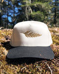 The Ranger Cap in black and natural with the embroidered cedar bough