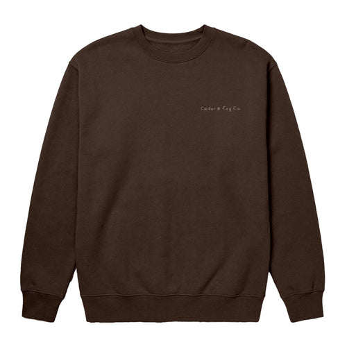 The Cabin Crew in Brown — front, hand-lettered wordmark on the chest
